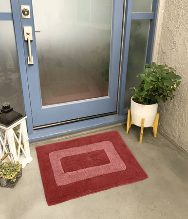 Designer Welcome Entry Doormat Placed Outside Entry Door with Plant and Lampの写真素材