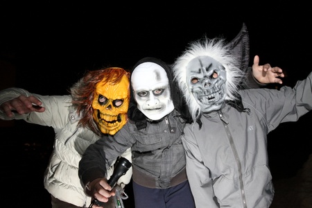 Children in halloween masks celebrates Halloween.のeditorial素材