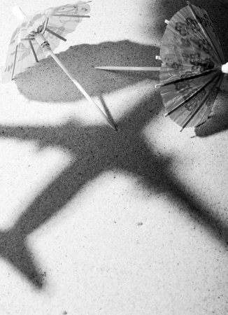 airplane over beachの写真素材