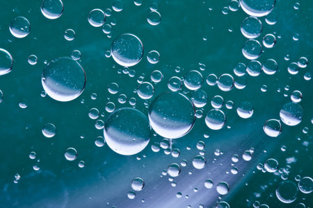 oil drops background with big and small drops