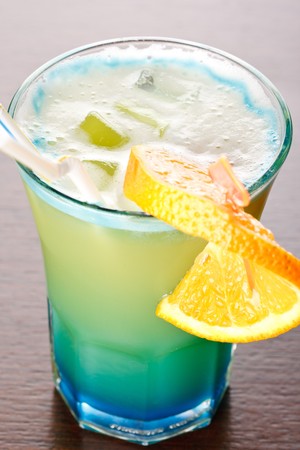 Summer drink decorated with a slice of orange の写真素材