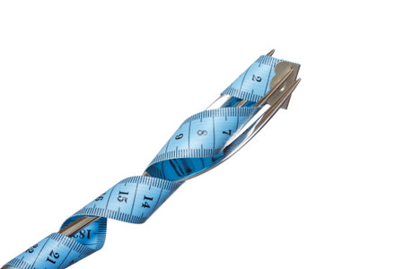 Fork and measuring tape の写真素材