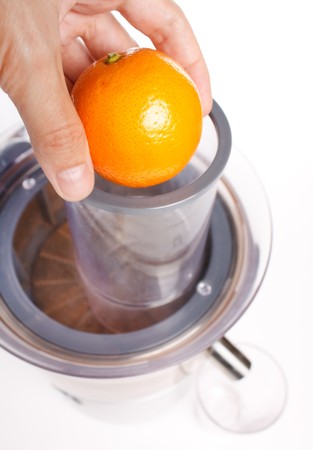 orange  in the juicerの写真素材