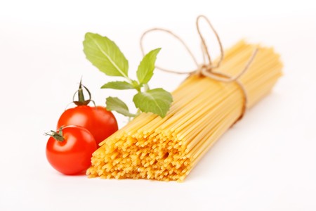 Italian Pasta with tomatoes and basilの写真素材