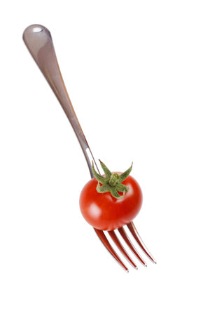fresh tomato on the fork