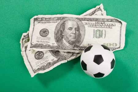 football and dollarsの写真素材