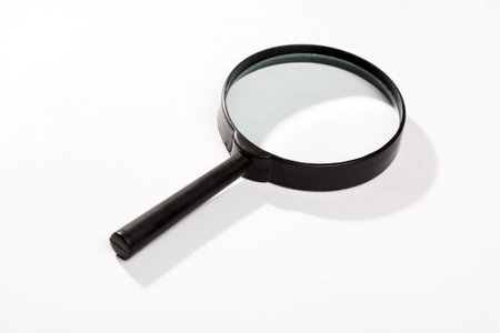 Magnifying glass on white background の写真素材