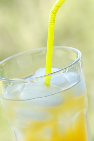 glass of orange juice with ice の写真素材