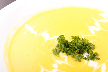Bowl of hot delicious pumpkin soup の写真素材