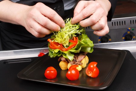 professional chef garnish tasty dish の写真素材