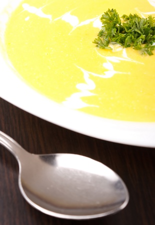 Bowl of hot delicious pumpkin soup の写真素材