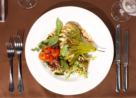 salad with pear, cherry tomatoes and blue cheeseの写真素材