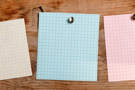 note paper on the wood backgroundの写真素材