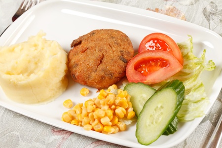 meat with potatoes and vegetablesの写真素材