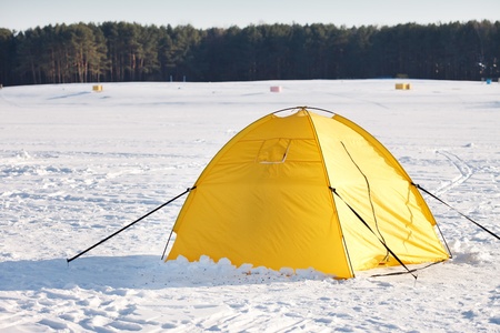 touristic tent in a winter plain の写真素材
