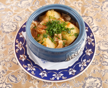 meat with potatoes in the pot の写真素材