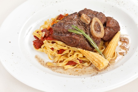 tasty steak with pasta の写真素材