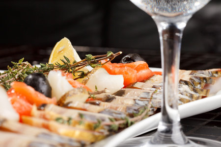 Fish delicacies on a festive table の写真素材