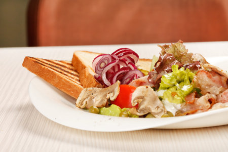 bacon with vegeatables and toastsの写真素材