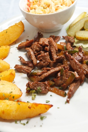 beef with roasted potatoesの写真素材