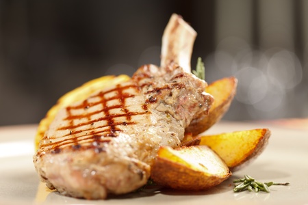 Grilled meat ribs with potatoesの写真素材