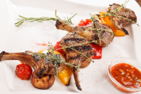 grilled meat ribs with vegetablesの写真素材