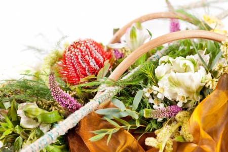 Beautiful flowers in a basket の写真素材