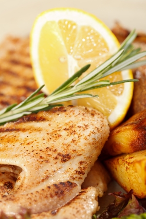 chicken with roasted potatoesの写真素材