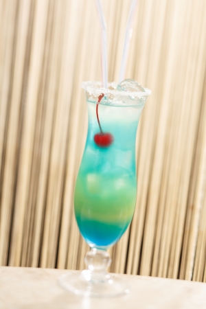 blue cocktail with cherryの写真素材