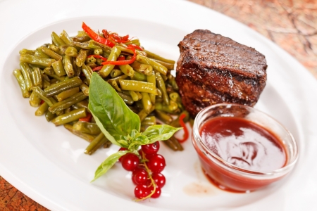 Grilled steak with vegetables の写真素材