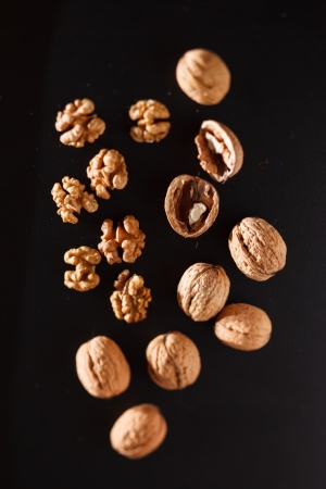 walnuts on black backgroundの写真素材