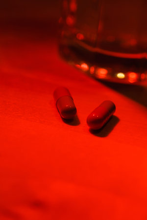 Glass of water and pillsの写真素材