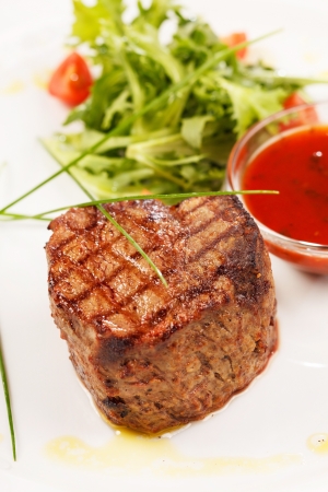 Grilled steak with sauceの写真素材