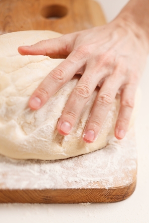 Dough on wooden boardの写真素材