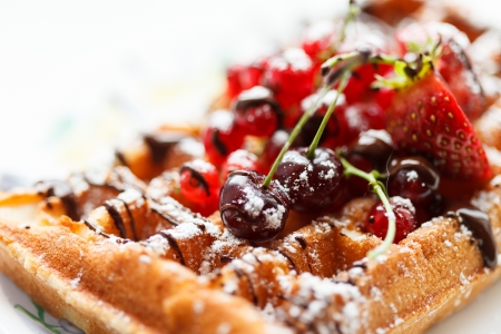 Belgian waffles with fruitの写真素材