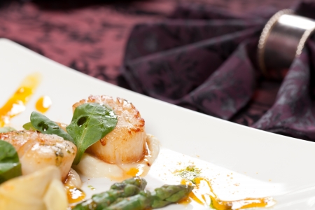 Baked scallops with asparagusの写真素材