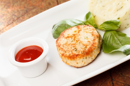 Meat cutlet with mashed potatoes の写真素材