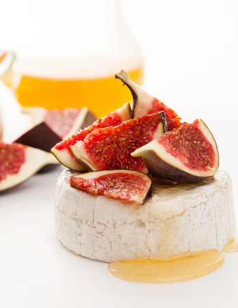Camembert cheese, figs and honeyの写真素材