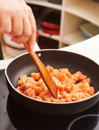 cooking healthy salmon in a panの写真素材