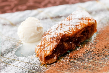 Apple strudel with vanilla ice cream の写真素材