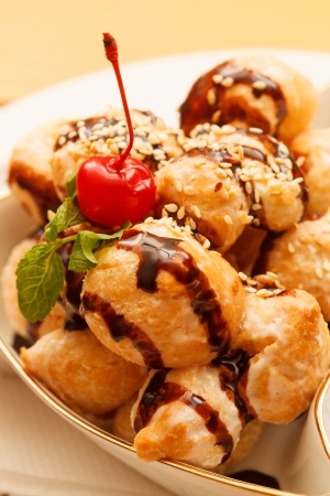 profiteroles with chocolateの写真素材