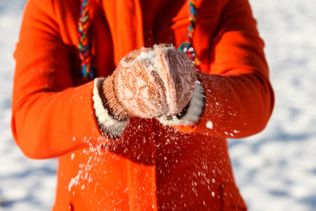woman hand in snowed gloves