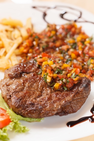 grilled steak with french fries の写真素材