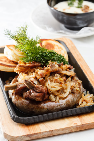 potato pancakes with mushroomsの写真素材