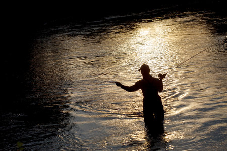 fisherman on the rive