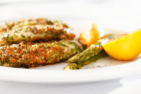 roasted fish with pumpkinの写真素材