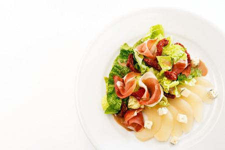 appetizer with pear, cheese and hamの写真素材