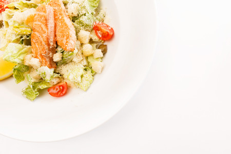 caesar salad with salmonの写真素材