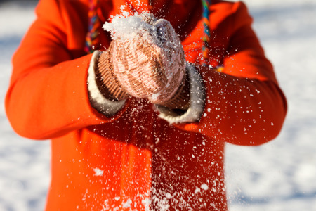 woman hand in snowed glovesの写真素材