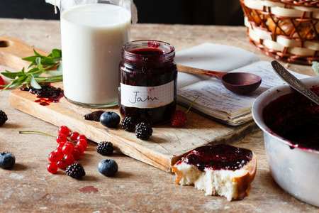 Berries jam on the tableの写真素材